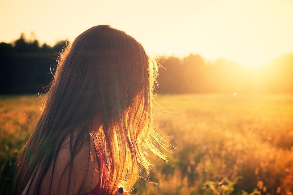 Woman Girl at sunlight on field