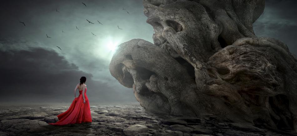 Woman on the mystical landscape with the light
