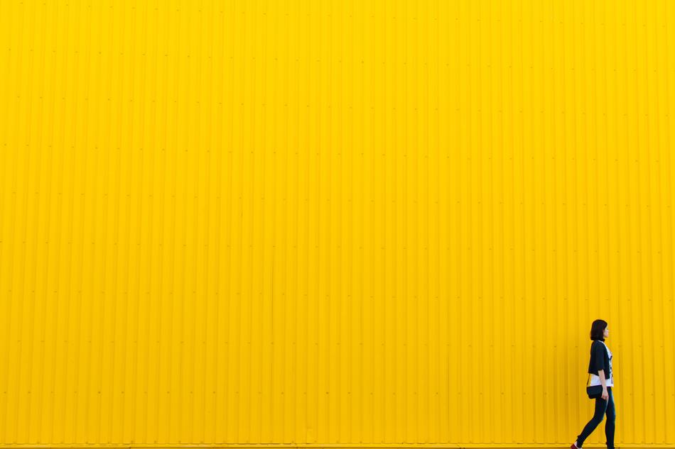 girl on the yellow wall