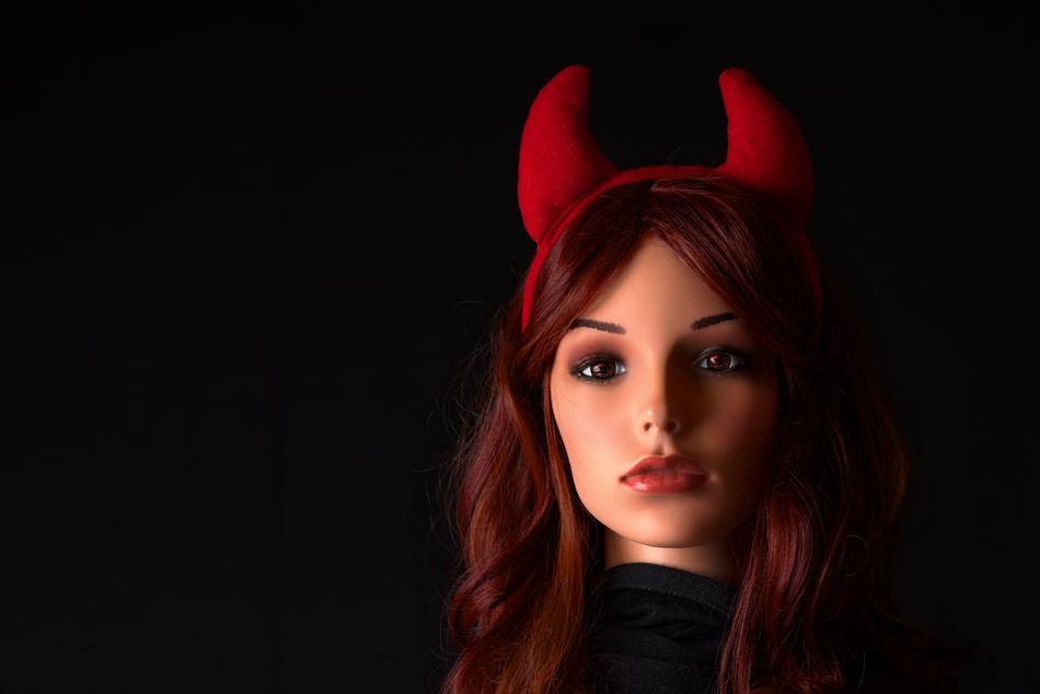graphic woman with devil’s horns