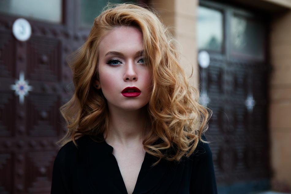 blonde with beautiful makeup on a city street