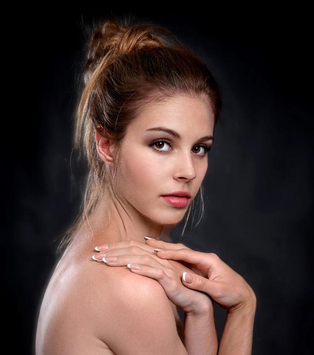 photo of girl with hand on shoulder
