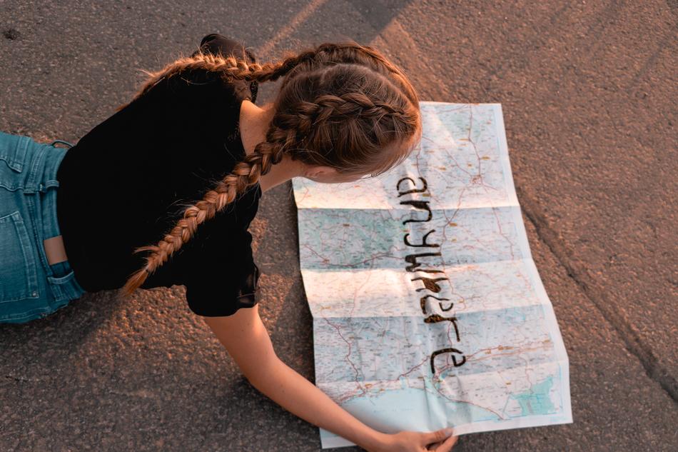 girl with braids with world map