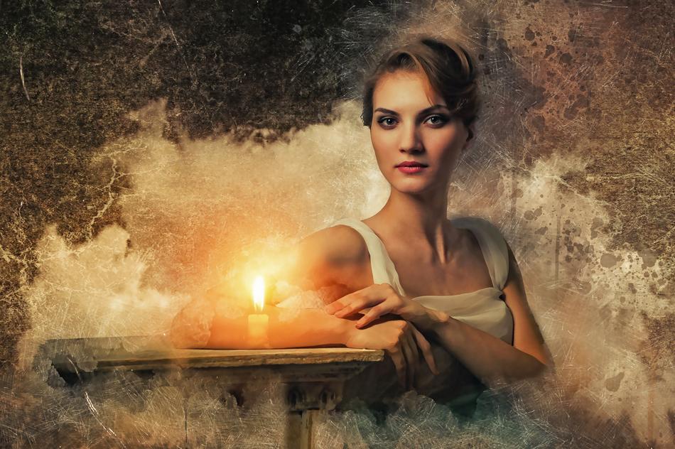 mystical image of a girl and a burning candle