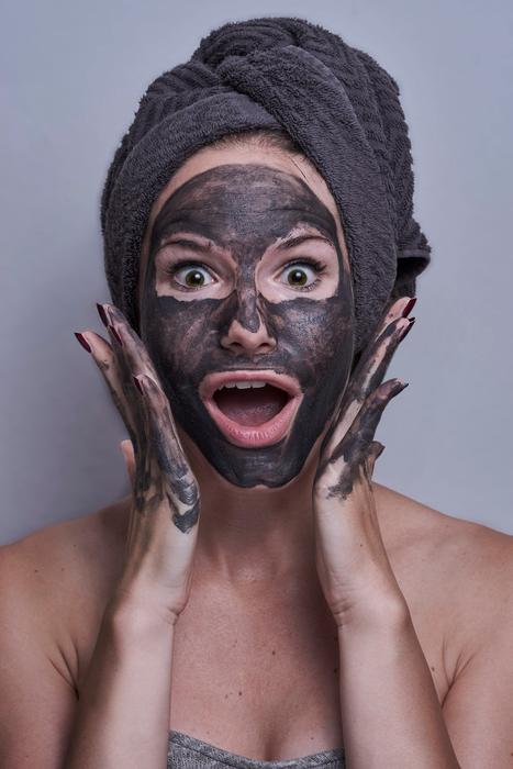 Portrait of the woman with the black facemask