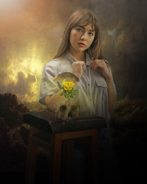 Gothic Fantasy, young girl posing at human skull with rose inside