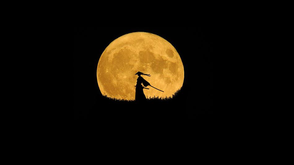 silhouette of a samurai on a background of the yellow moon