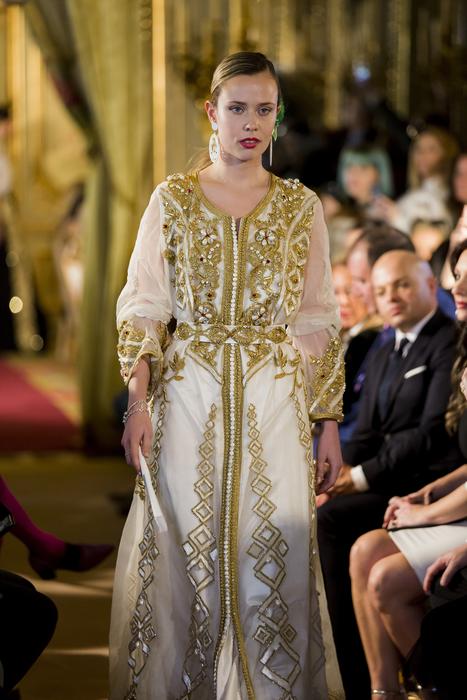 photo of a girl in an arabian dress on the catwalk