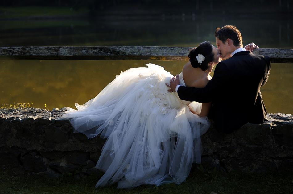 Bride and groom Love near water