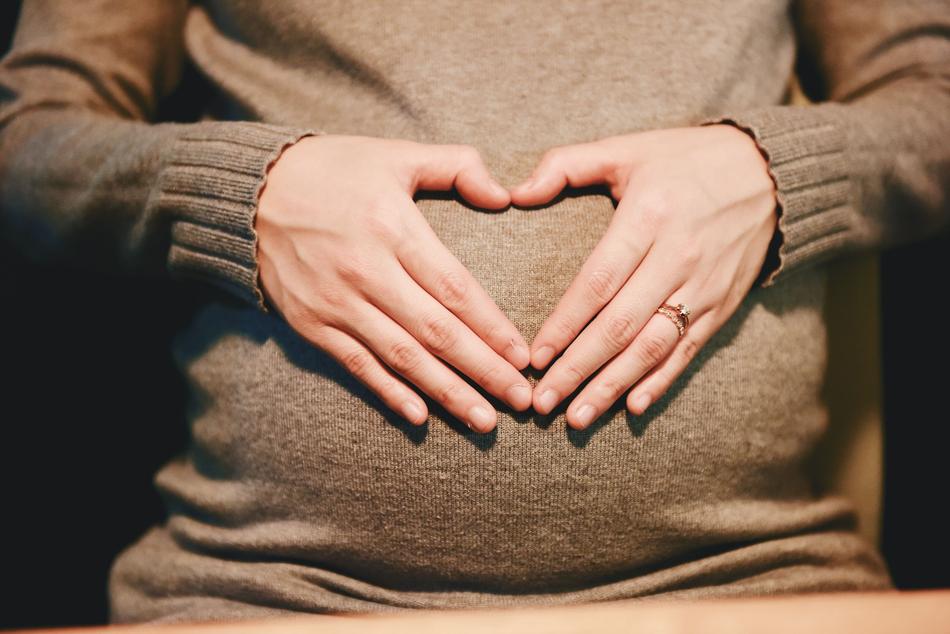 Hands on Pregnant Woman
