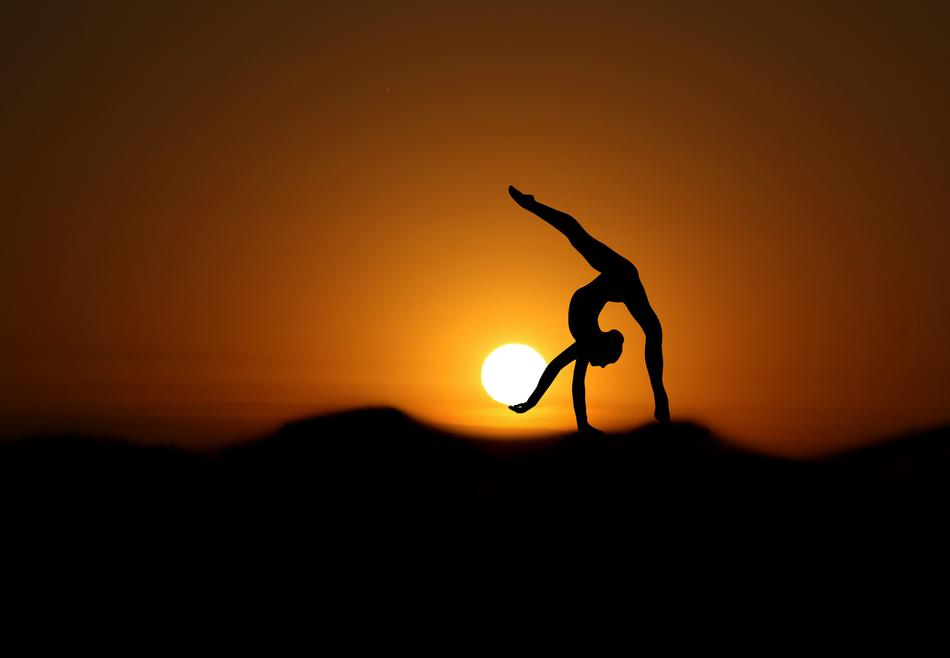 gymnast at sunset