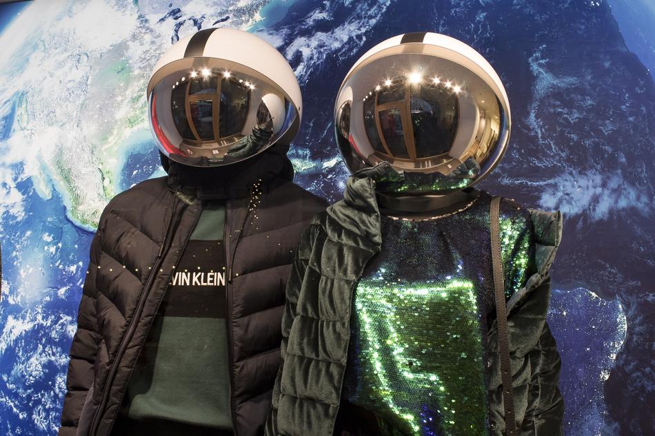 portrait of couple in astronaut suits
