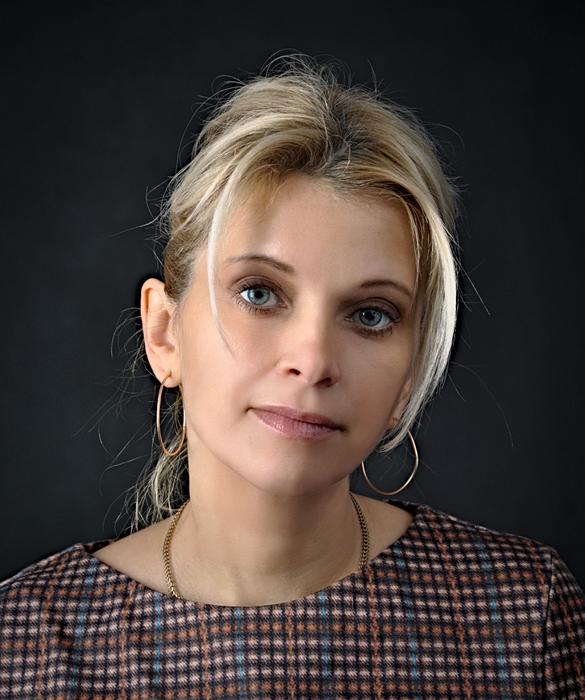 blonde in checkered dress