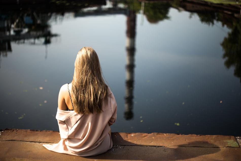 blonde near the lake with reflections