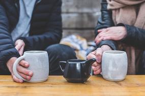 stylish coffee mugs and pot