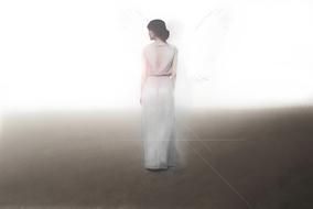 woman as an angel in bright light