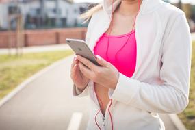 woman with iphone on blurred background