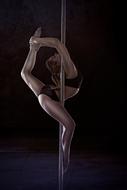girl is dancing with a pylon