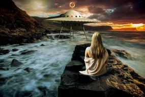 girl on a rock by the sea looking at a ufo