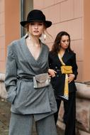 two young girls in Designer clothe on street