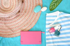womens summer clothes, sunglasses and a straw hat