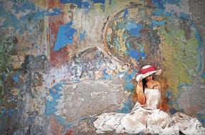 painted on canvas girl in a white dress and hat