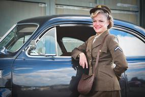 Vintage Woman Soldier near auto