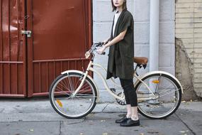 photo of fashion model with bicycle