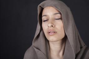 young woman with covered head