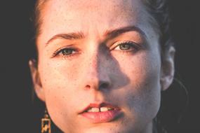 portrait of a woman with freckles