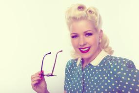 blonde in retro polka dot dress