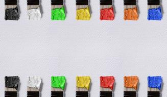 photo of different paints on brushes
