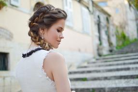 Girl during a photo shoot on the stairs