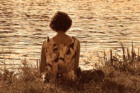 Vintage photo of the woman near the water