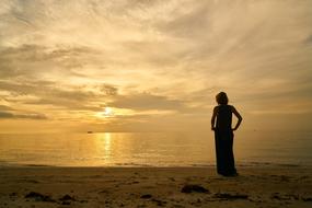 Woman Model on coast at Sunset