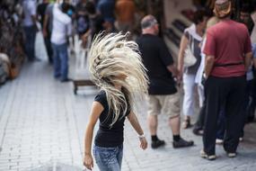 Woman with the blonde hair on the street