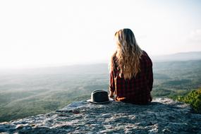 lonely woman admiring evening