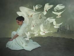 Drawing of a woman in white dress with beautiful, flying, white pigeons on landscape