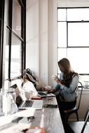 girl working with laptop in office