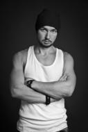 man in white undershirt