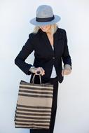 stylish woman with shopping bag