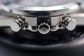 macro picture of crown of wrist watch