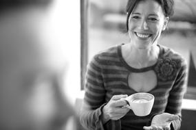 happy woman with cup of coffee