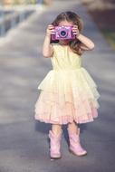 girl with a toy camera