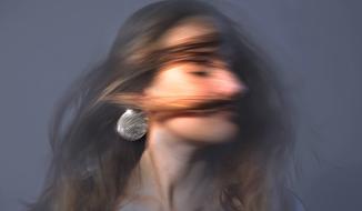 attractive girl's hair movement