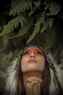 Beautiful woman model with the colorful make-up and hat