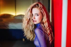 portrait of a woman with volume blond hair