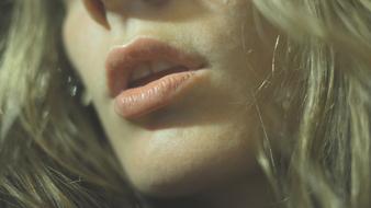 lips of a blonde close up