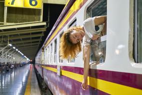 girl peeping from the train car