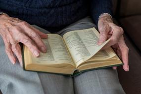 old person with book